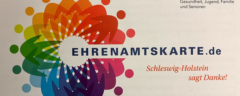 Bunte Karte mit dem Aufdruck Ehrenamtskarte - Schleswig-Holstein sagt danke.